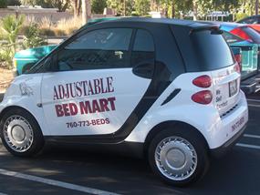 PICTURE OF COMAPNY SMART CAR